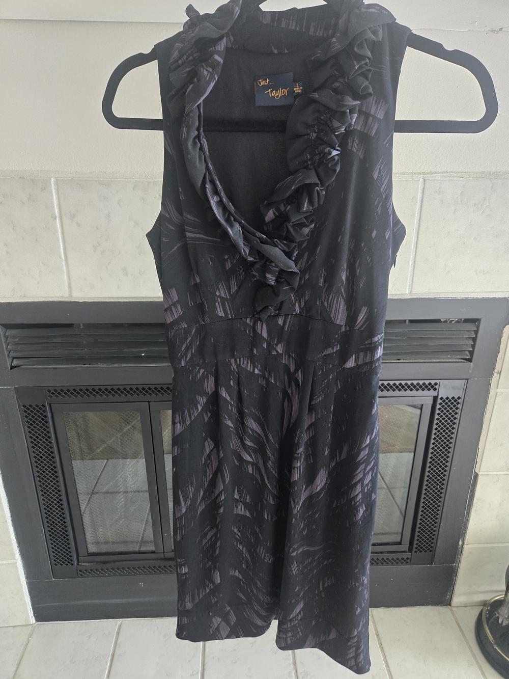 Sleeveless Black Dress with Subtle Purple Print and Ruffle Neck by T Tahari